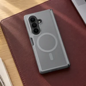DUXDUCIS Phone Case for Samsung Fold8 Ultra Fold7 - Grey Samsung Z Fold8 Ultra and Z Fold7 case on a burgundy leather writing pad beside an olive water glass and silver laptop