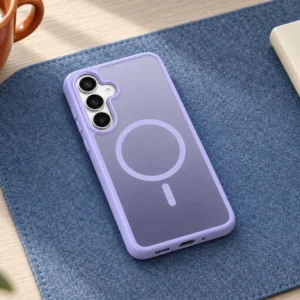 DUXDUCIS Phone Case for Samsung S26 FE-S25 FE - Light Purple Samsung S26 FE / S25 FE case on a denim-blue felt desk mat beside an orange coffee cup and cream notebook