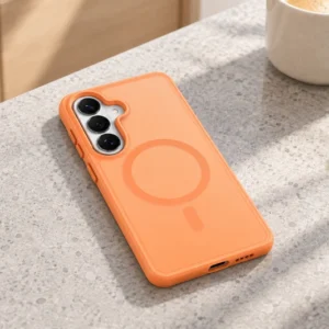 DUXDUCIS Phone Case for Samsung S26 - Orange Samsung S26 case on a light grey kitchen island beside a ceramic coffee mug