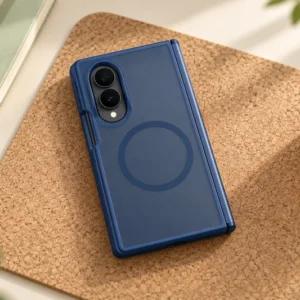 DUXDUCIS Phone Case for Samsung Z Fold8 - Dark Blue Samsung Z Fold8 case on a tan cork desk mat beside a pale green notebook and terracotta coffee cup