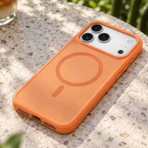 DUXDUCIS Phone Case for iPhone 17 Pro V2 - Orange case in a sunlit outdoor cafe scene